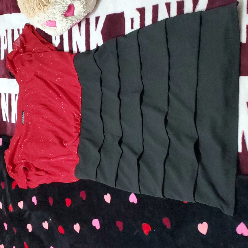 Never worn. Red sparkle with black ruffle dress. Size 10P